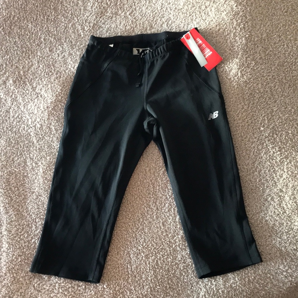 Never worn New Balance capris with tags